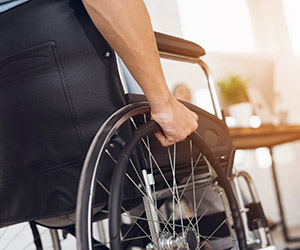 Handicapped employee using wheelchair